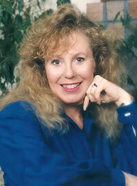 Suzanne M Kelly