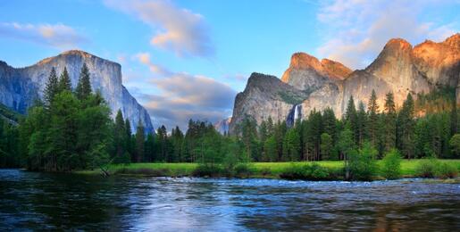 Panorama of the Yosemite Valley (El Capitan, Cathedral Rocks, Bridalveil Falls) at the Merced River.